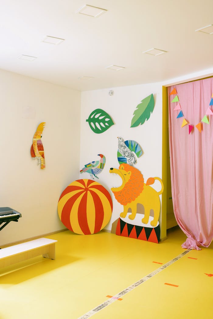 Bright playroom with cardboard animal figures, ideal for children spaces.